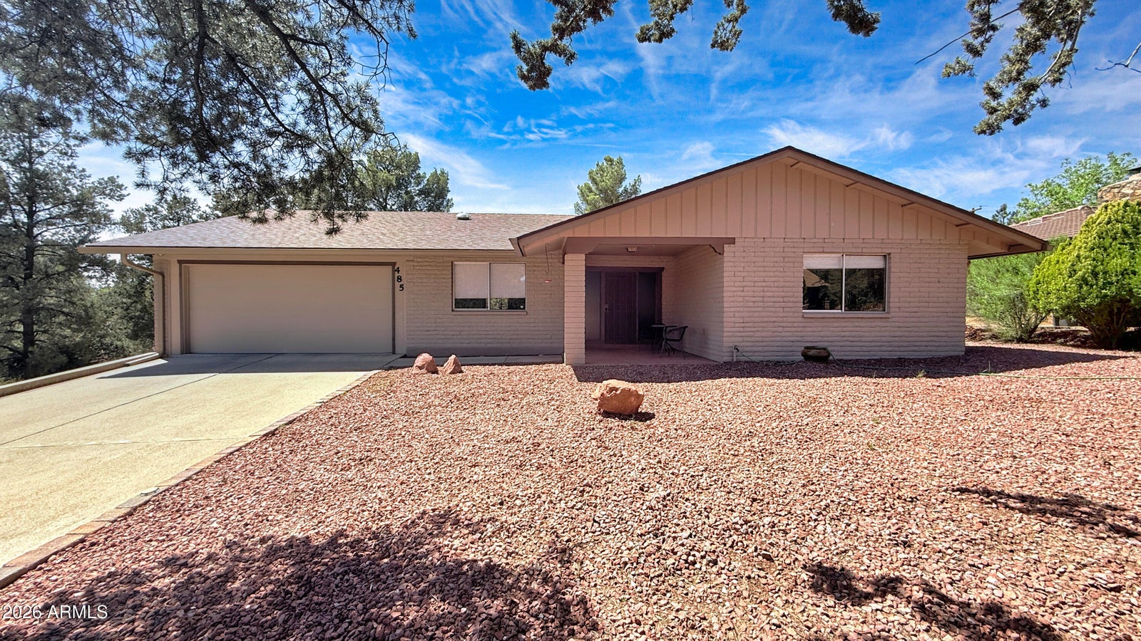 485 Mountain Shadows Drive, Sedona AZ aerial view with red rock backdrop